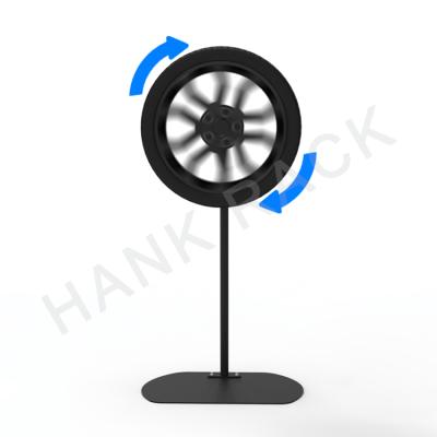 China Q235 Exhibition Trade Show Tire Center Steel Repair Shop Spinning Wheel Display Rim Rack Stand Spinning Tire for sale