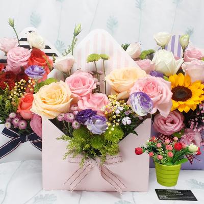 China Customized Wholesale Recyclable Wrap Luxury Kraft Paper Flower Box for sale