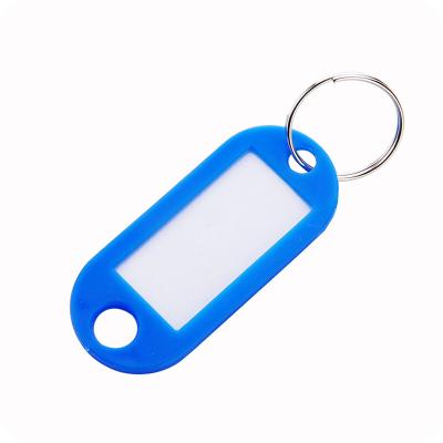 China Cheap Cheap Plastic Colors PVC Key Indicator White Custom Key Chain With Ring for sale