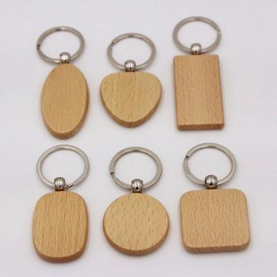 China Blank Custom Logo Engraved Named Promotional Souvenir Craft Masks woodkeychain Key Chain House Keychain for sale