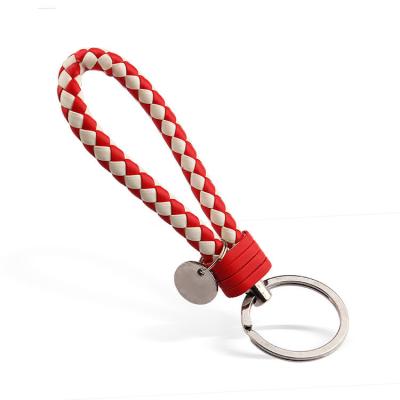 China Handmade Keychains PU Key Chains Hang Rope Lanyard Leather Knitting Pendant for sale