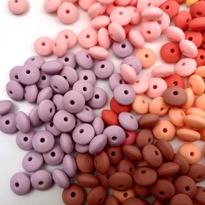 China 100% Food Grade 99 Color 12MM Non-Toxic Wholesale Non-Toxic Bpa Baby Chewing Lens Silicone Loose Soft Beads For Teething Jewelry for sale