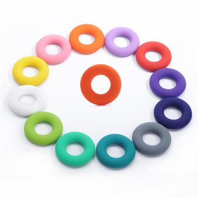 China 100% Food Grade Non-Toxic Donuts Baby Silicone Teeth Ring Colorful Circle Beads DIY Necklace Babi Toys Chewing Teeth Toys Kids Gift for sale