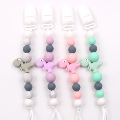 China Baby Chewable Beaded Wooden Dummy Silicone Holder Wholesale Soother BPA Free Chewable Dummy Silicone Holder Soother Chain Clip for sale