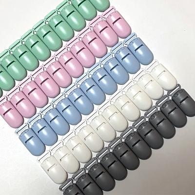 China 100% Eco-friendly/Hot Sale Fashion Baby Pacifier Chain Clip Candy Non-toxi Christmas Colors Plastic Dummy Safety Nipple Clip Suspender Belt Clips for sale