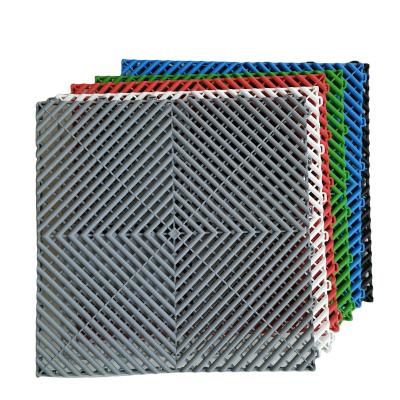 China Qingdao Modern Readygo Interlocking PVC Garage Tiles Warehouse Slab Rib Garage Floor Tiles PVC Floor Mat for sale