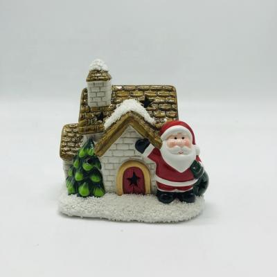 China Ceramic Funny Europe Christmas Decoration Village House Santa Claus With LED for sale