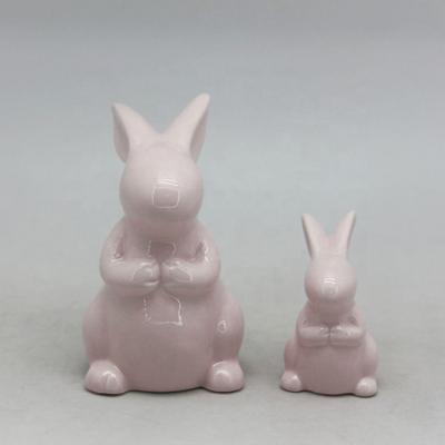 China Lovely Cartoon Easter Decoration Dolomite Easter Bunny Traditional Amazon Figurine for sale