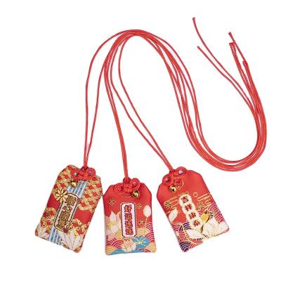 China Oshou Putuoshan small fortune Japanese traditional Oshou blessing pendant bag handbag brocade bag for sale