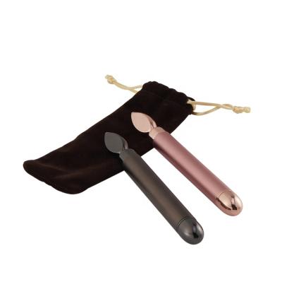 China Custom 24k Rose Gold Eye Massager Face Lift Skin Care Handy Facial Logo Vibrating Roller for sale