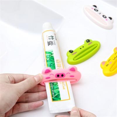 China Viable Korean Style Creativity Milk Squeezer Cartoon Toothpaste Lazy Cleaning Expelling Manual Squeezer for sale