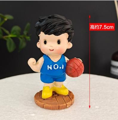 China New Resin Basketball Boy Soccer Doll Cake Decorating Accessories Resin Motor Boy Gilrs Baking Toys for sale