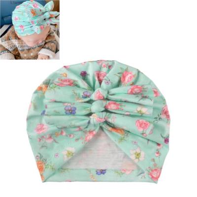 China 2021 unisex hot sale picture baby cute sweet knitted printed fabric pleated bow for kids turban hats for sale