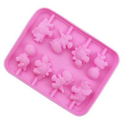 China Viable 8 Cavity Dinosaur Shape Lollipop Silicone Mold with 20 Sticks Fondant Candy Mold for sale