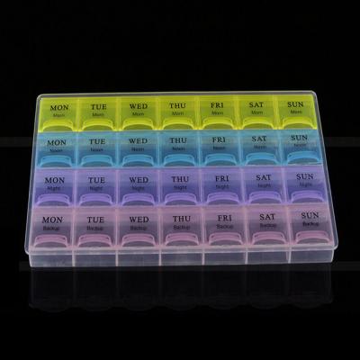 China Plastic Storage Box Waterproof 28 Compartment Large One Week Pill Storage Box Rectangle Shape Pill Box for sale