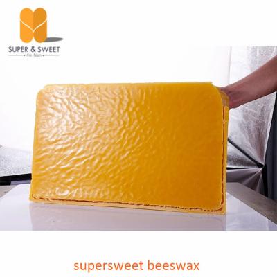 China Pure beeswax slabs honey bee wax raw bee wax for candle making for sale