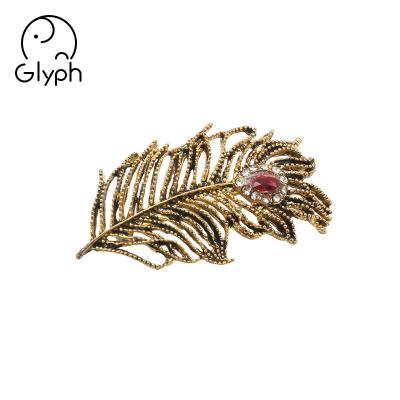 China Eco-friendly Wholesale Fashion Metal Feather Pearl Brooch Breast Pin Hijab for sale