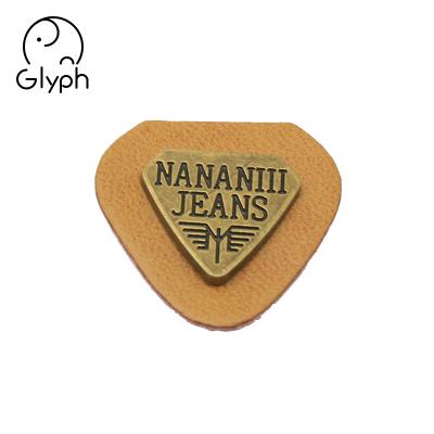 China Durable Custom Leather Denim Triangle Shape Back Patches With Metal Logo Label Tags For Jeans for sale