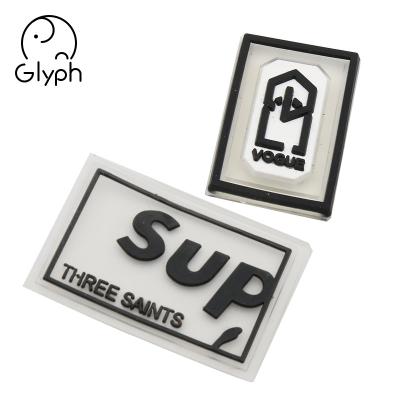 China Sustainable hot sale custom apparel logo rubber label , silicone label embossed soft pvc rubber labels for clothing for sale