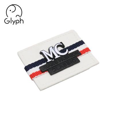 China Sustainable Jeans Fashion Classic Custom Leather Patches With Metal Logo Apparel Tags For Denim for sale