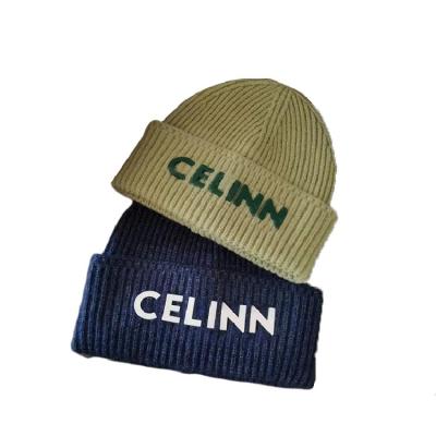 China breathable & Waterproof 2022 new products high elastic fashion stereo letter printing solid color wool beanie hat for men and women for sale