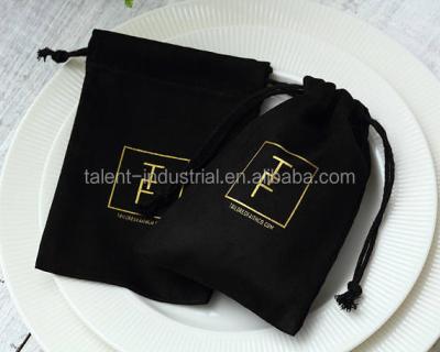 China Recyclable Luxury Black Drawstring Faux Suede Jewelry Pouches Promotional Bags With Gold Logo for sale