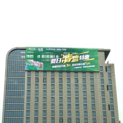 China Outdoor Building P25 Tower Top Media Facade Advertising LED Screen Mesh Video Display for sale