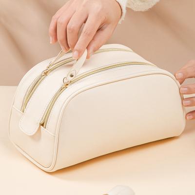 China Fashion Custom Logo PVC Double Zipper Cosmetic Bag Waterproof Bathroom Toiletry Makeup Bag for sale