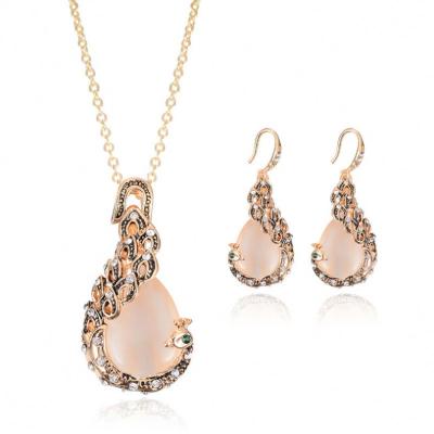 China Women Gift Fashion CLASSIC Peacock Shape Pink Gemstone Jewelry Sets Gold Plated Color Rhinestone Party Jewelry Set High Quality for sale