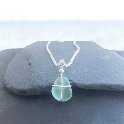 China Romantic Sea Glass Floating Outer Banks Badge Head Beach Jewelry Badge Head Beach Necklace Pendant for sale