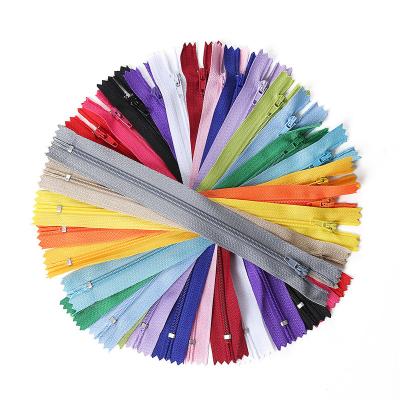 China 3# 5# Sustainable Netting Colorful End-End Colored Invisible Nylon Zipper For Clothes Pants Or Home Textile for sale