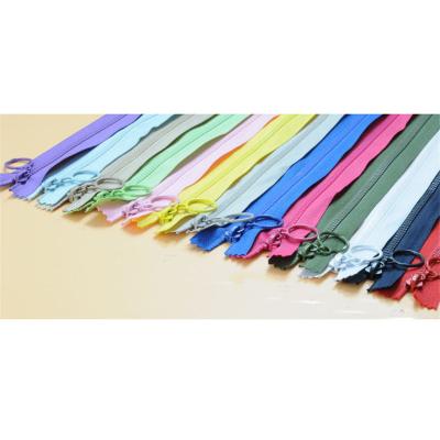 China Viable Children Color Resin Zippers China Supplier Invisible Zipper Roll Nylon Zipper For Garment Accessories for sale