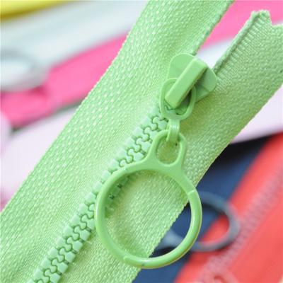 China Multi Viable Kids Color Plastic Open End Zipper Invisible Zipper For Garment Accessories for sale