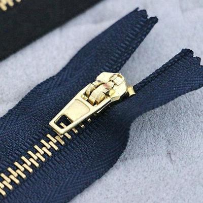 China Durable Brass 3#/5# Zipper With Semi Auto Lock Slider For Jeans for sale