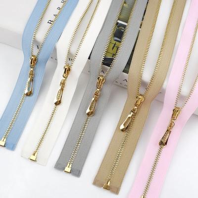 China 3# 50cm Diy Jacket Dress Bag Workable Garment Sewing Auto Lock Light Gold Metal Material Open Zipper for sale