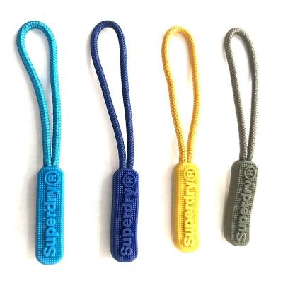 China Durable Rope Head Logo Pvc Plastic Rubber Slider Rope Zipper Puller for sale