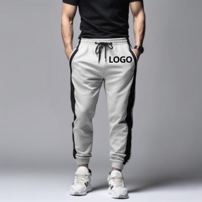 China Custom Streetwear Mens Stacked Joggers With Pocket Anti-wrinkle Logo Men Sweatpants Flares Cargo Stacked Culotte Pants for sale