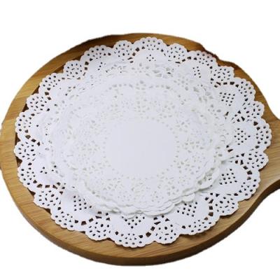 China Sustainable Food Grade paper lace placemats for sale