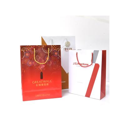 China Food Bags Wholesale Shopping Gift Craft Handle Kraft Paper Bags Customized Environmental Bags for sale