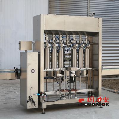 China Adopt Panasonic Servo Motor to Drive Piston Pumps Solidpack Car Motor Oil Full Automatic Servo Motor Filling Machine with 4 Heads for sale