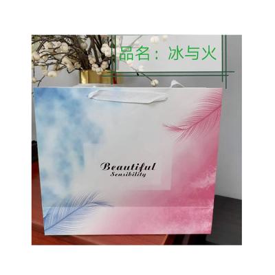 China Clothes Fashionable Trend Of High Quality Clothing Packaging Paper Bags for sale