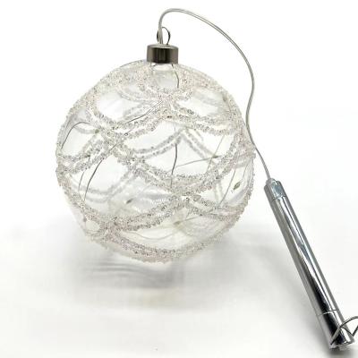 China Designed Batter Operated Lead Glass Bauble Ball Christmas Clear Handle Led Ornaments for sale