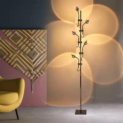 China Modern Led Projection Floor Lamp Living Room Sofa Lamp Sunset Light And Shade Led Corner Floor Lamp for sale