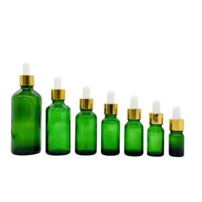 China Hot Sale 5ml/10ml/15ml/20ml/30ml/50ml/100ml Personal Care Green Essential Oil Bottle Perfume Bottle Glass Dropper Bottle for sale