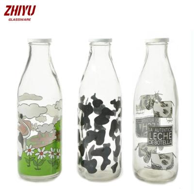 China Wishing Wholesale 34oz  customized decal design round mouth juice milk glass bottles for baby with lid for sale