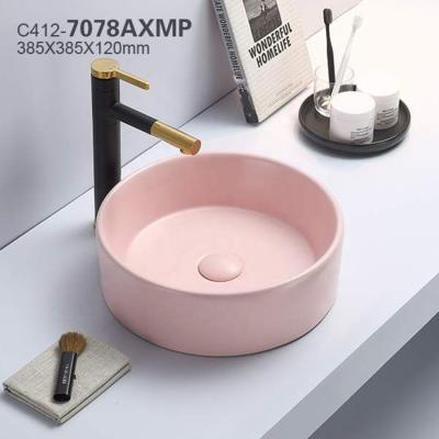 China Eco - Friendly Bathroom Pink Color Round Decorative Matt Ceramic Basin for sale