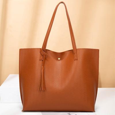 China Shoulder Tote Bag Wave Pattern Handbag Large Capacity Shoudler Handbag With Tassel Vintage PU Bags For Women for sale