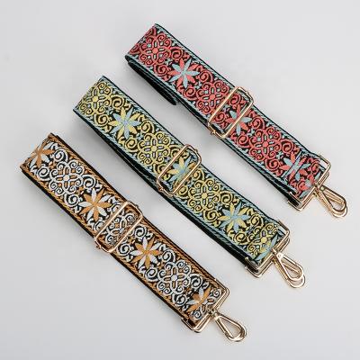 China Fashionable in stretching 2022 high quality webbing woven bag straps flower jacquard fabric bag shoulder strap for sale