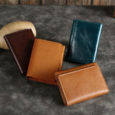 China Multifunctional Waterproof Men's Wallet Purse RFID Card Holder Genuine Leather Wallet for Men with Buckle Opening for sale