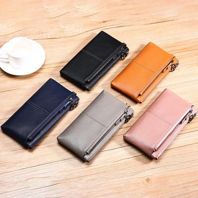 China New 2021 Fashion Women's Central Statistical Institute Fashion Leather Money Purse Multifunctional Card Holder Ladies Grab Purse Wallet for sale